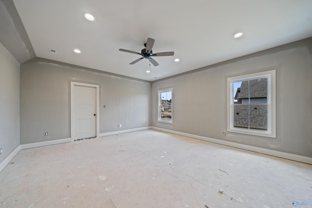 empty room featuring recessed lighting, visible vents, ceiling fan, and baseboards