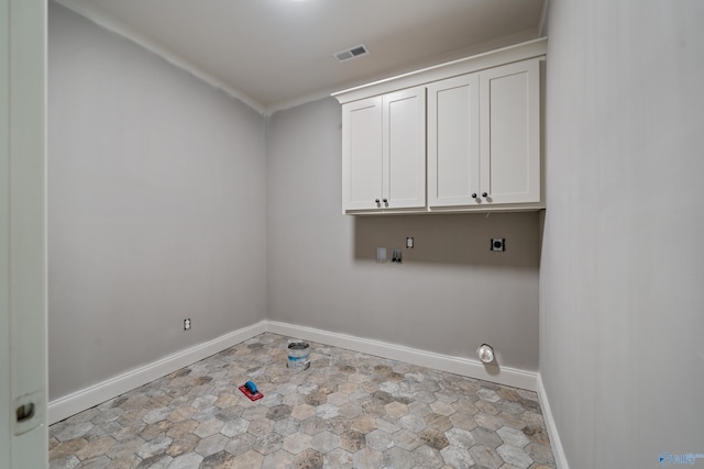 washroom featuring cabinet space, baseboards, visible vents, and electric dryer hookup