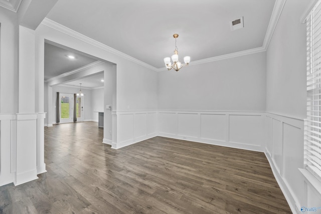 interior space with crown molding, visible vents, dark wood-type flooring, and a notable chandelier
