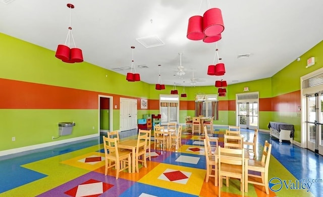 playroom with a ceiling fan, baseboards, visible vents, and french doors
