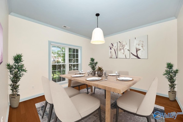 114 Canterbury Dr, Madison, AL 35758 - dining space featuring crown molding and wood finished floors