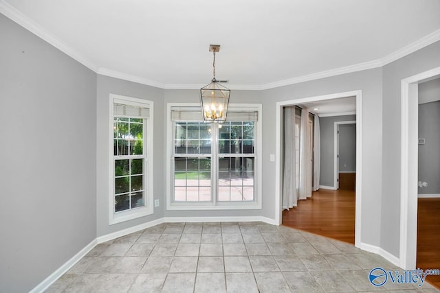 114 Canterbury Dr, Madison, AL 35758 - unfurnished dining area featuring a chandelier, ornamental molding, and light tile patterned floors