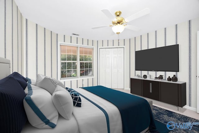 114 Canterbury Dr, Madison, AL 35758 - bedroom featuring wallpapered walls, a closet, and a ceiling fan
