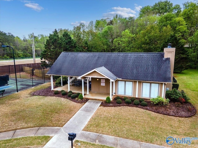 114 Canterbury Dr, Madison, AL 35758 - view of front of home featuring a porch, a chimney, and a shingled roof