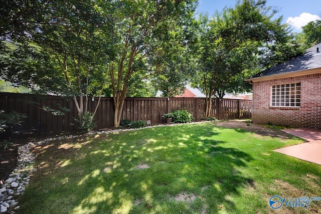 114 Canterbury Dr, Madison, AL 35758 - fenced backyard with a patio area