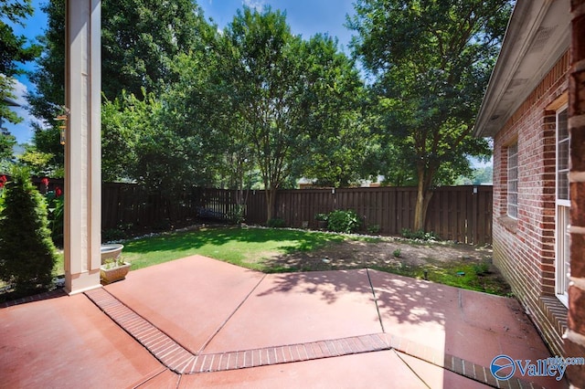 114 Canterbury Dr, Madison, AL 35758 - fenced backyard featuring a patio