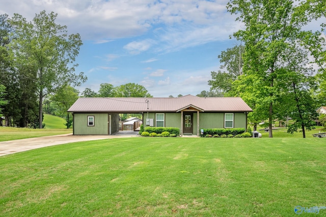 915 County Road 349, Leesburg, AL 35983 - single story home with metal roof, a carport, a front lawn, and concrete driveway