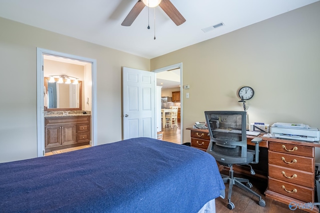 915 County Road 349, Leesburg, AL 35983 - bedroom featuring connected bathroom, ceiling fan, wood finished floors, and visible vents