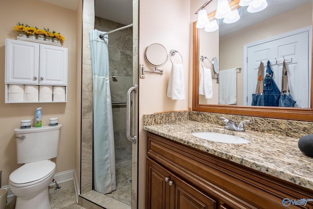 915 County Road 349, Leesburg, AL 35983 - bathroom featuring a shower stall, toilet, vanity, and baseboards