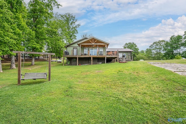 915 County Road 349, Leesburg, AL 35983 - rear view of property featuring a wooden deck and a yard