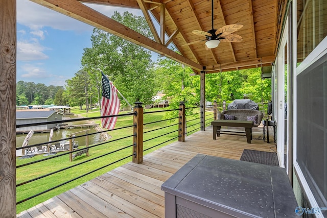 915 County Road 349, Leesburg, AL 35983 - wooden deck featuring a lawn, a water view, and a ceiling fan