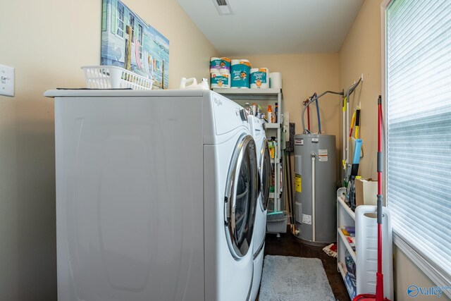 915 County Road 349, Leesburg, AL 35983 - laundry area featuring laundry area, visible vents, a healthy amount of sunlight, independent washer and dryer, and electric water heater