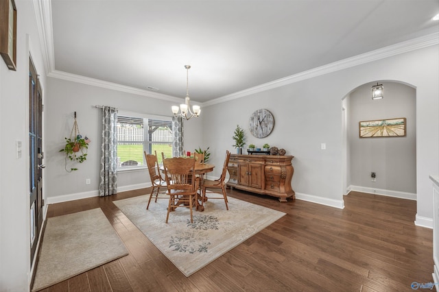7417 Nature Walk Way SE, Owens Cross Roads, AL 35763 - dining room with arched walkways, a chandelier, ornamental molding, dark wood-style flooring, and baseboards