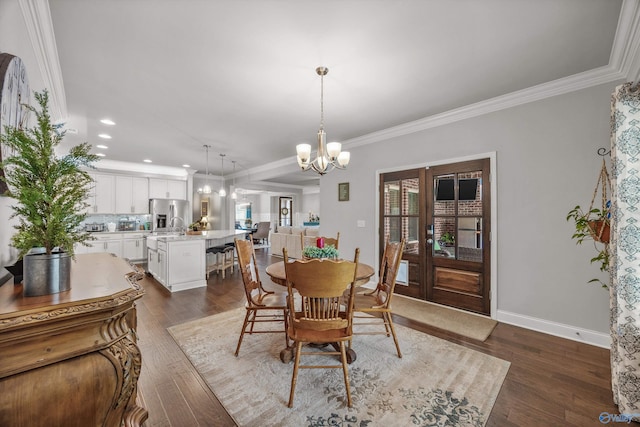 7417 Nature Walk Way SE, Owens Cross Roads, AL 35763 - dining area with ornamental molding, dark wood-type flooring, a chandelier, recessed lighting, and baseboards