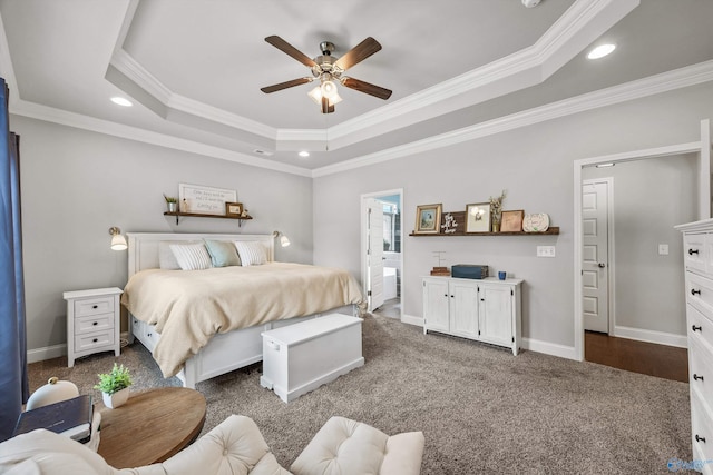 7417 Nature Walk Way SE, Owens Cross Roads, AL 35763 - bedroom with a tray ceiling, crown molding, recessed lighting, dark colored carpet, and baseboards