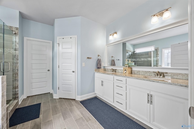 7417 Nature Walk Way SE, Owens Cross Roads, AL 35763 - full bathroom featuring double vanity and a stall shower
