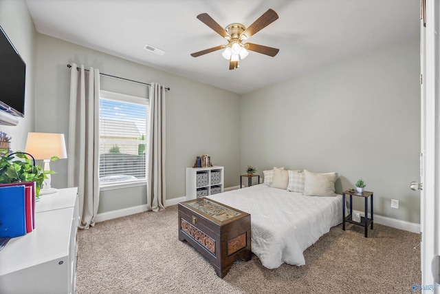 7417 Nature Walk Way SE, Owens Cross Roads, AL 35763 - bedroom featuring light carpet, baseboards, and ceiling fan