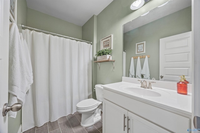7417 Nature Walk Way SE, Owens Cross Roads, AL 35763 - bathroom with vanity, toilet, a shower with curtain, and wood finish floors