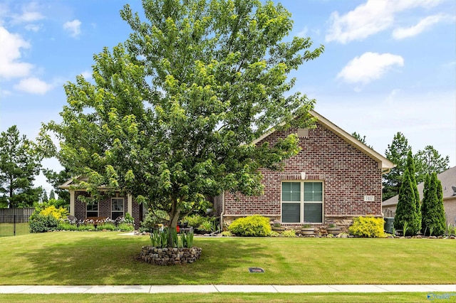 7417 Nature Walk Way SE, Owens Cross Roads, AL 35763 - view of property hidden behind natural elements featuring brick siding