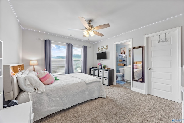 7417 Nature Walk Way SE, Owens Cross Roads, AL 35763 - carpeted bedroom with connected bathroom and ceiling fan