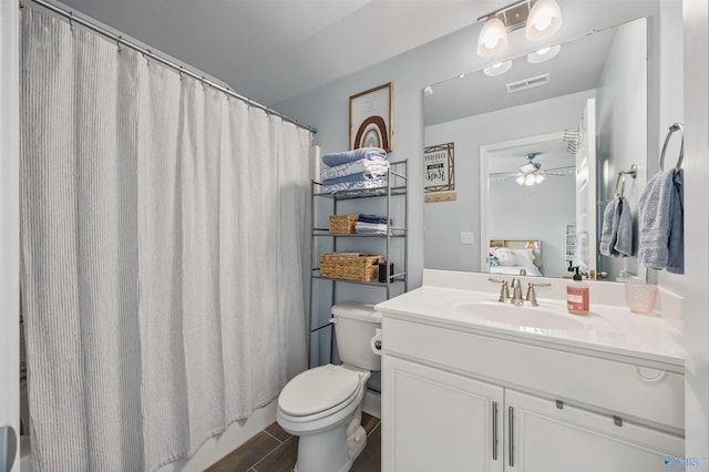 7417 Nature Walk Way SE, Owens Cross Roads, AL 35763 - full bath featuring ceiling fan, toilet, vanity, and shower / bath combination with curtain