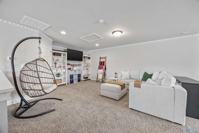 7417 Nature Walk Way SE, Owens Cross Roads, AL 35763 - carpeted living area featuring attic access, recessed lighting, and baseboards