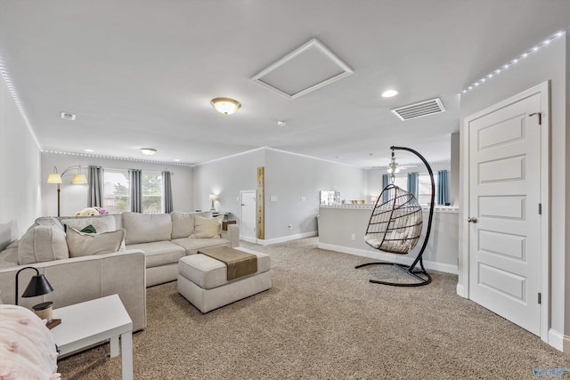 7417 Nature Walk Way SE, Owens Cross Roads, AL 35763 - living area with carpet flooring, attic access, baseboards, and recessed lighting