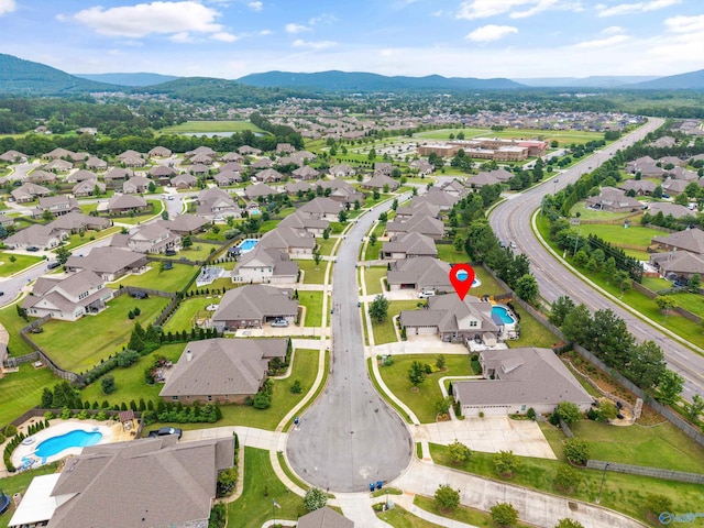 7417 Nature Walk Way SE, Owens Cross Roads, AL 35763 - aerial perspective of suburban area with a mountainous background and a pool area