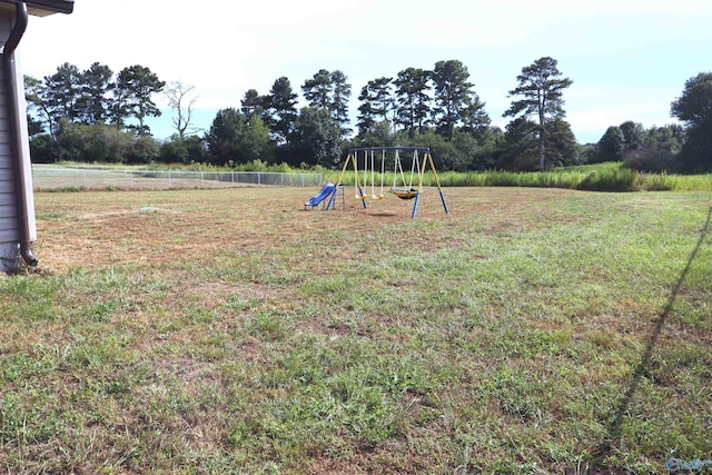 view of yard featuring a playground