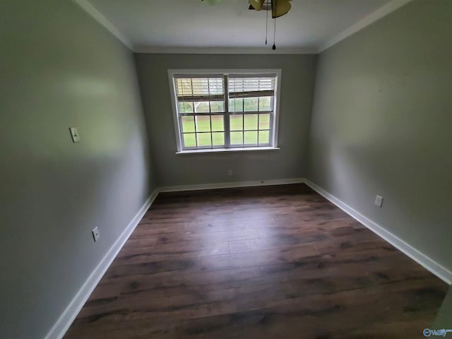 unfurnished dining area with crown molding, ceiling fan, and dark wood-type flooring