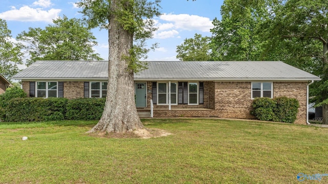 2055 Big Nose Dr, Centre, AL 35960 - ranch-style home featuring brick siding, a front yard, and metal roof