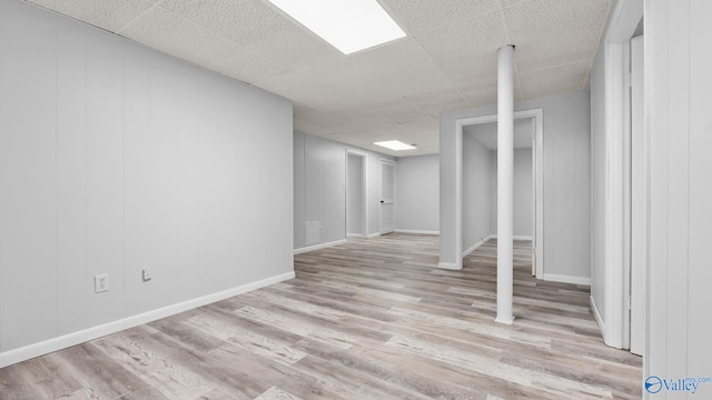 2055 Big Nose Dr, Centre, AL 35960 - finished below grade area featuring light wood finished floors, a drop ceiling, and baseboards