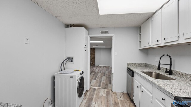 2055 Big Nose Dr, Centre, AL 35960 - washroom featuring washer / dryer, a sink, and light wood-style flooring