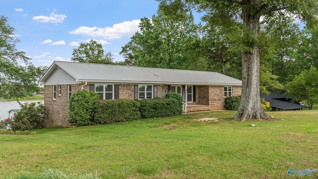 2055 Big Nose Dr, Centre, AL 35960 - single story home with brick siding, a front lawn, and metal roof