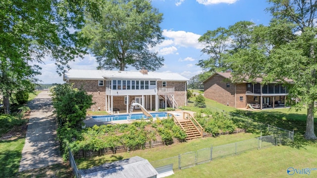 2055 Big Nose Dr, Centre, AL 35960 - back of house featuring stairs, a sunroom, brick siding, a chimney, and a deck