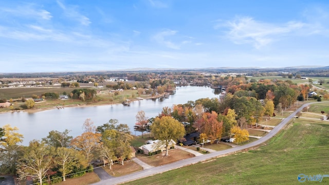 birds eye view of property featuring a rural view and a water view