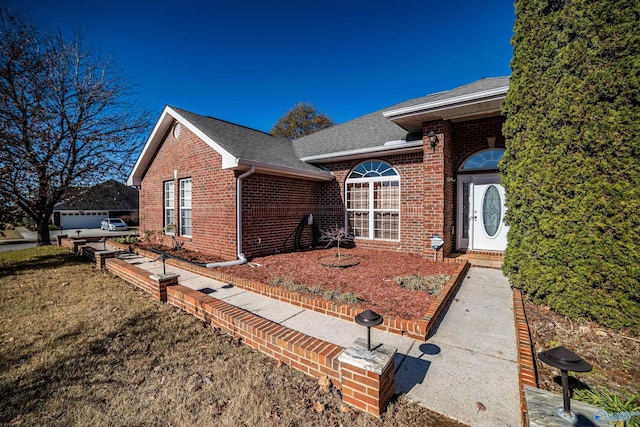 view of front of home with a front yard