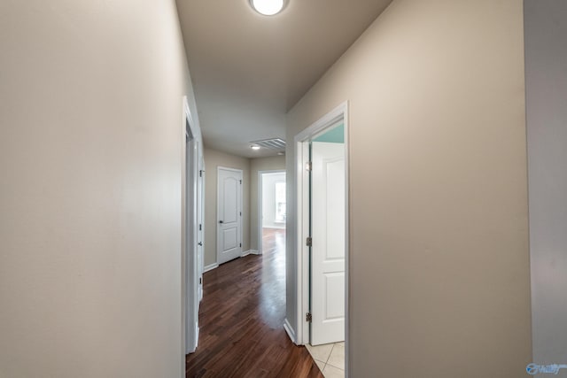 hallway featuring hardwood / wood-style flooring