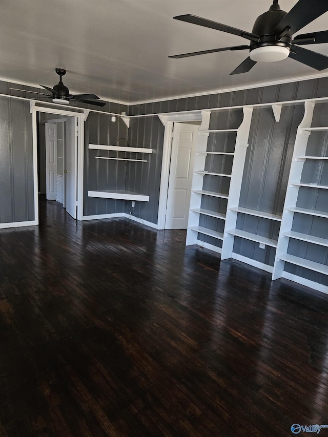 unfurnished living room featuring hardwood / wood-style floors and ceiling fan