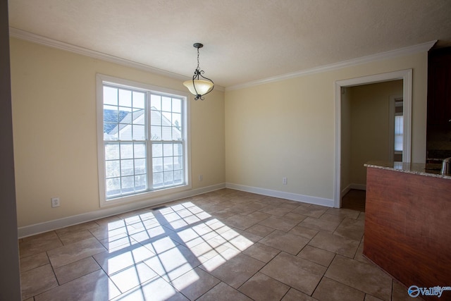 unfurnished dining area featuring ornamental molding