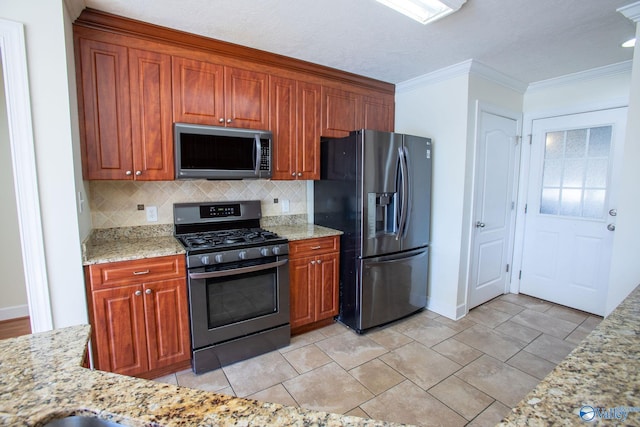 kitchen featuring light stone counters, ornamental molding, stainless steel appliances, and tasteful backsplash