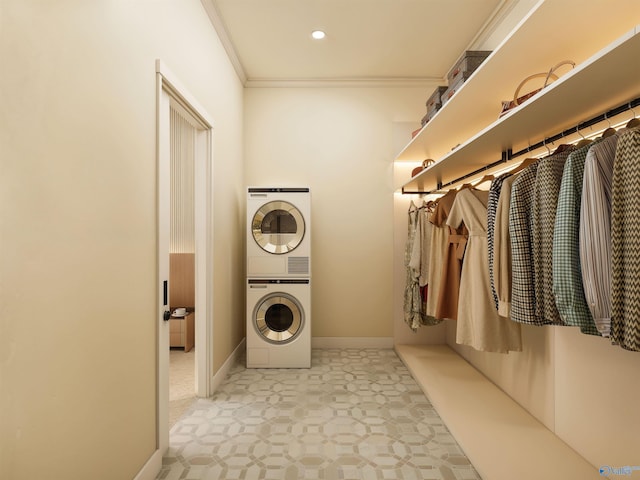 6103C Randolph Ave Unit 3C, Huntsville, AL 35801 - laundry area featuring estacked washer and dryer, crown molding, baseboards, tile patterned floors, and recessed lighting