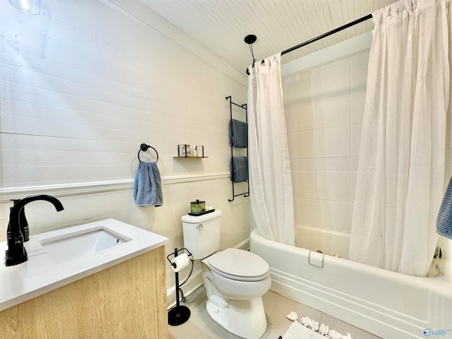 full bathroom featuring ornamental molding, vanity, tile patterned flooring, shower / tub combo, and toilet