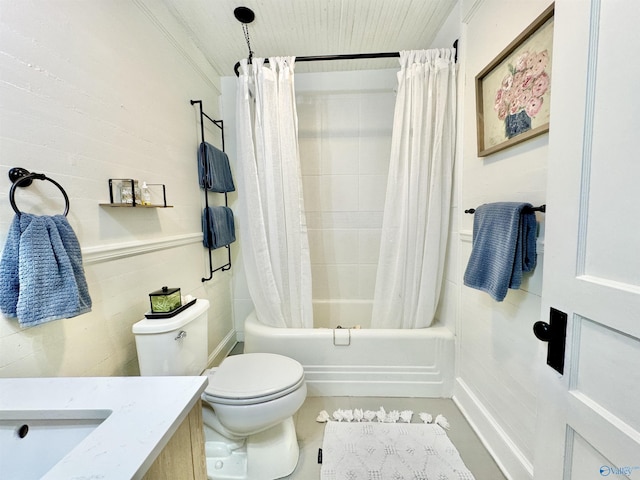 full bathroom with vanity, shower / bath combination with curtain, and toilet