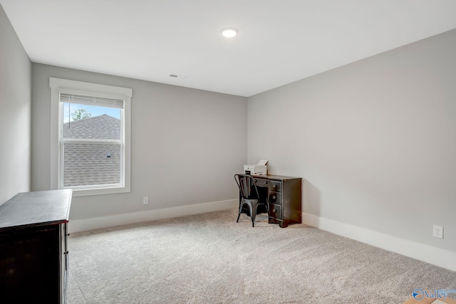 home office with light carpet