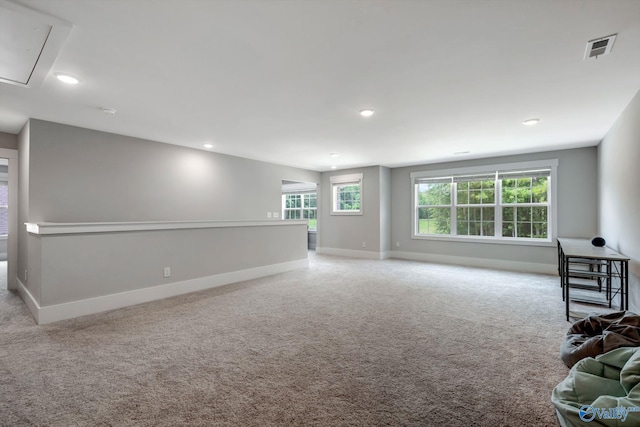 interior space featuring light colored carpet