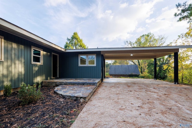 1002 Woodbine Rd, Madison, AL 35758 - exterior space featuring driveway and an attached carport