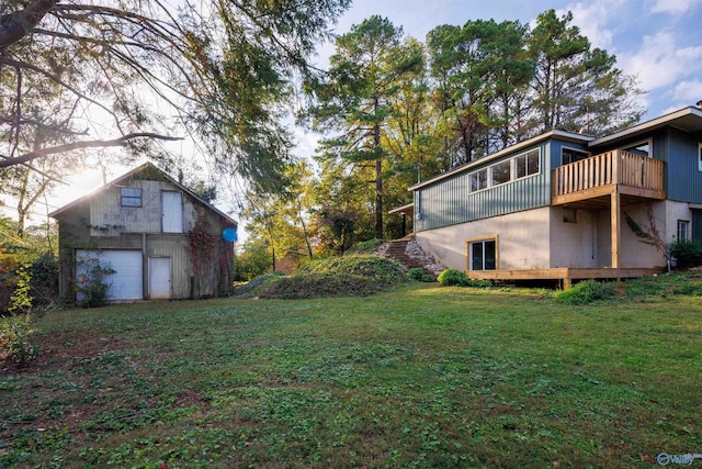 1002 Woodbine Rd, Madison, AL 35758 - view of yard featuring a wooden deck and a detached garage