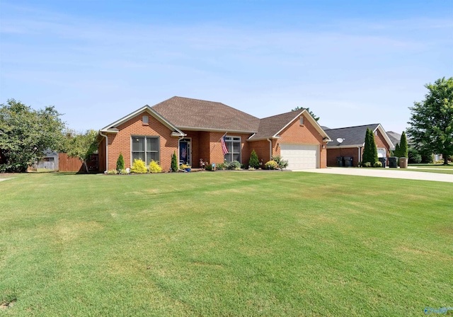 ranch-style home featuring a garage, brick siding, driveway, and a front lawn