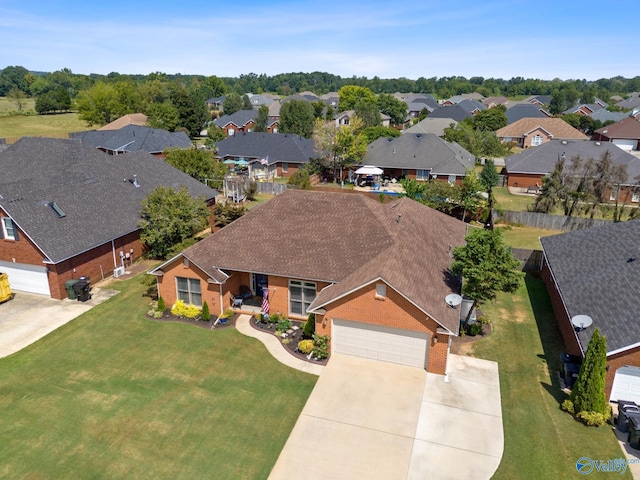 drone / aerial view with a residential view